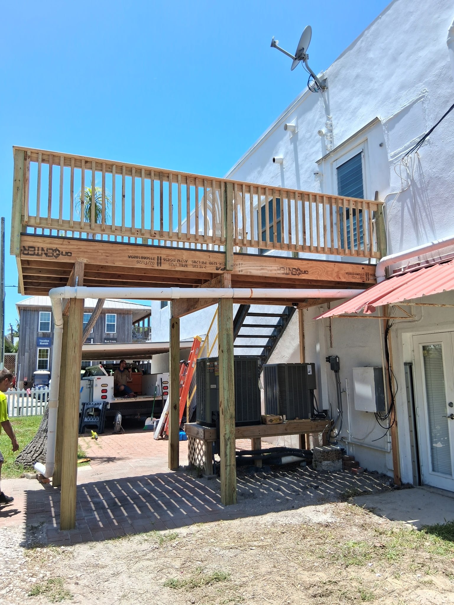 Deck addition framing in progress by C Level Remodeling