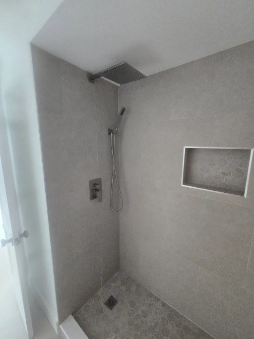 Finished tile shower remodel by C Level Remodeling
