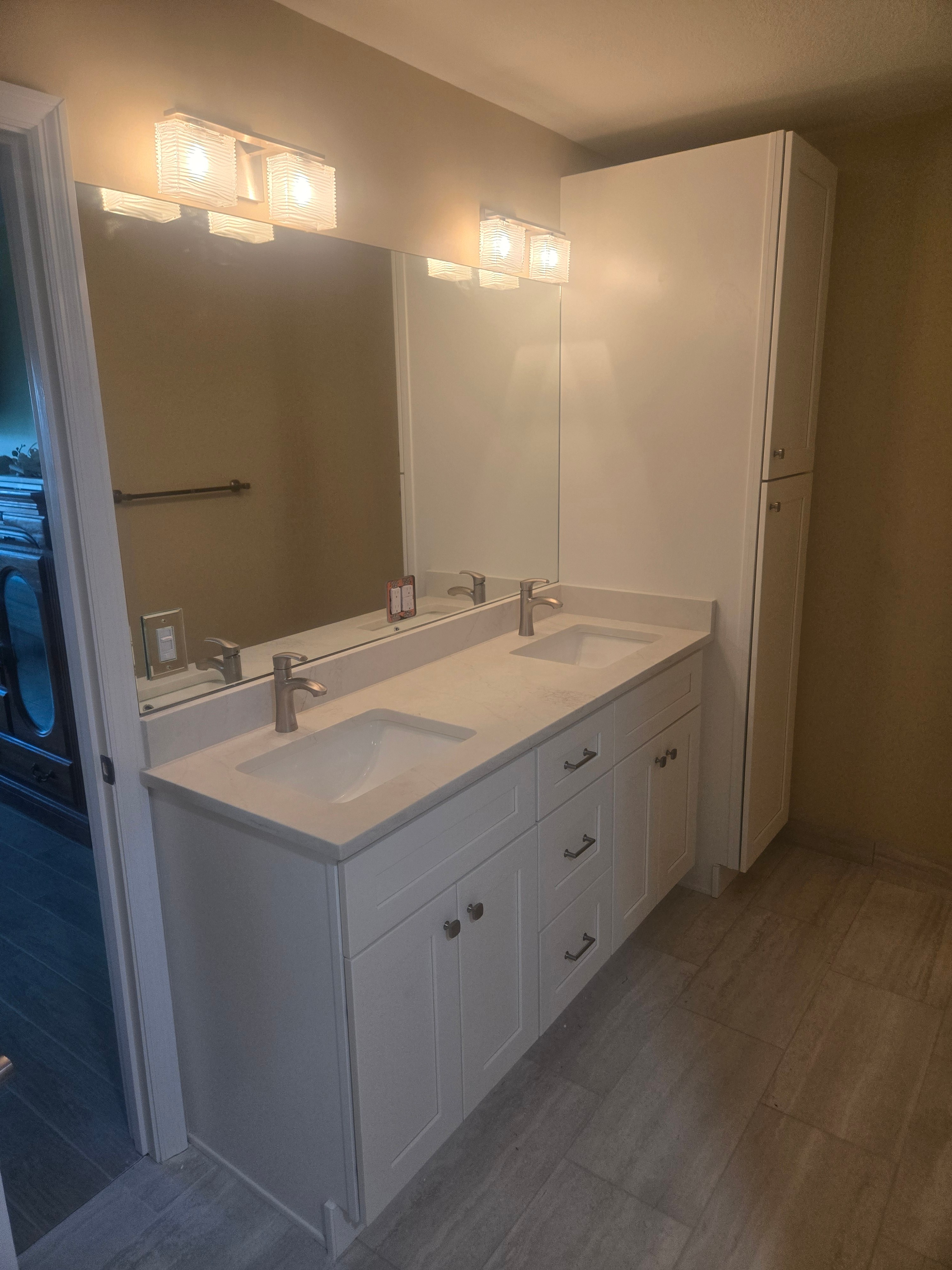 Finished double-sink vanity remodel by C Level Remodeling