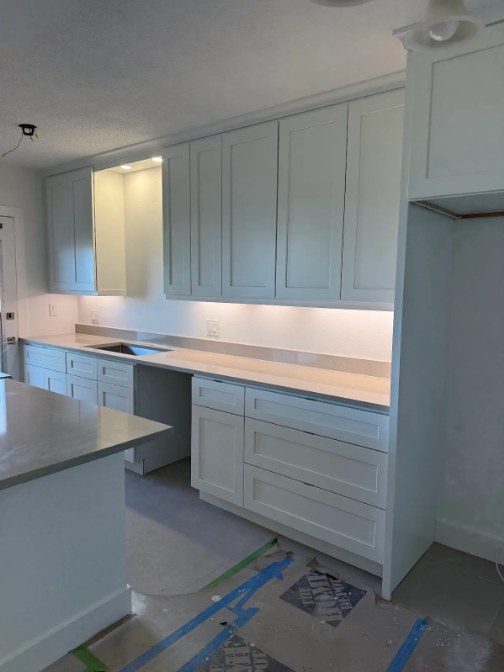 Kitchen cabinetry nearing completion by C Level Remodeling